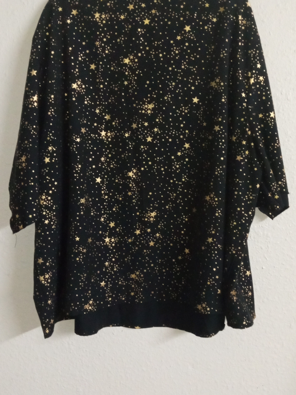 Amazon Women's Black Pullover with Gold Star Print